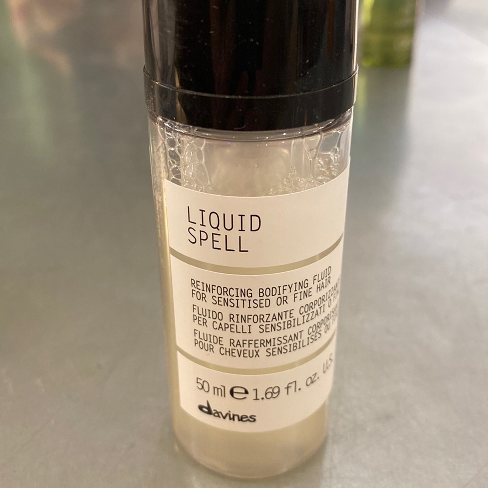 Davines reinforcing, bodifying fluid for sensitized or fine hair